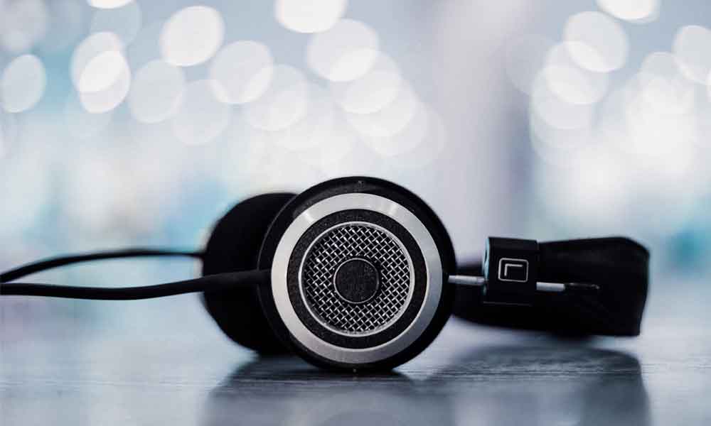 Photograph of headphones laying on table